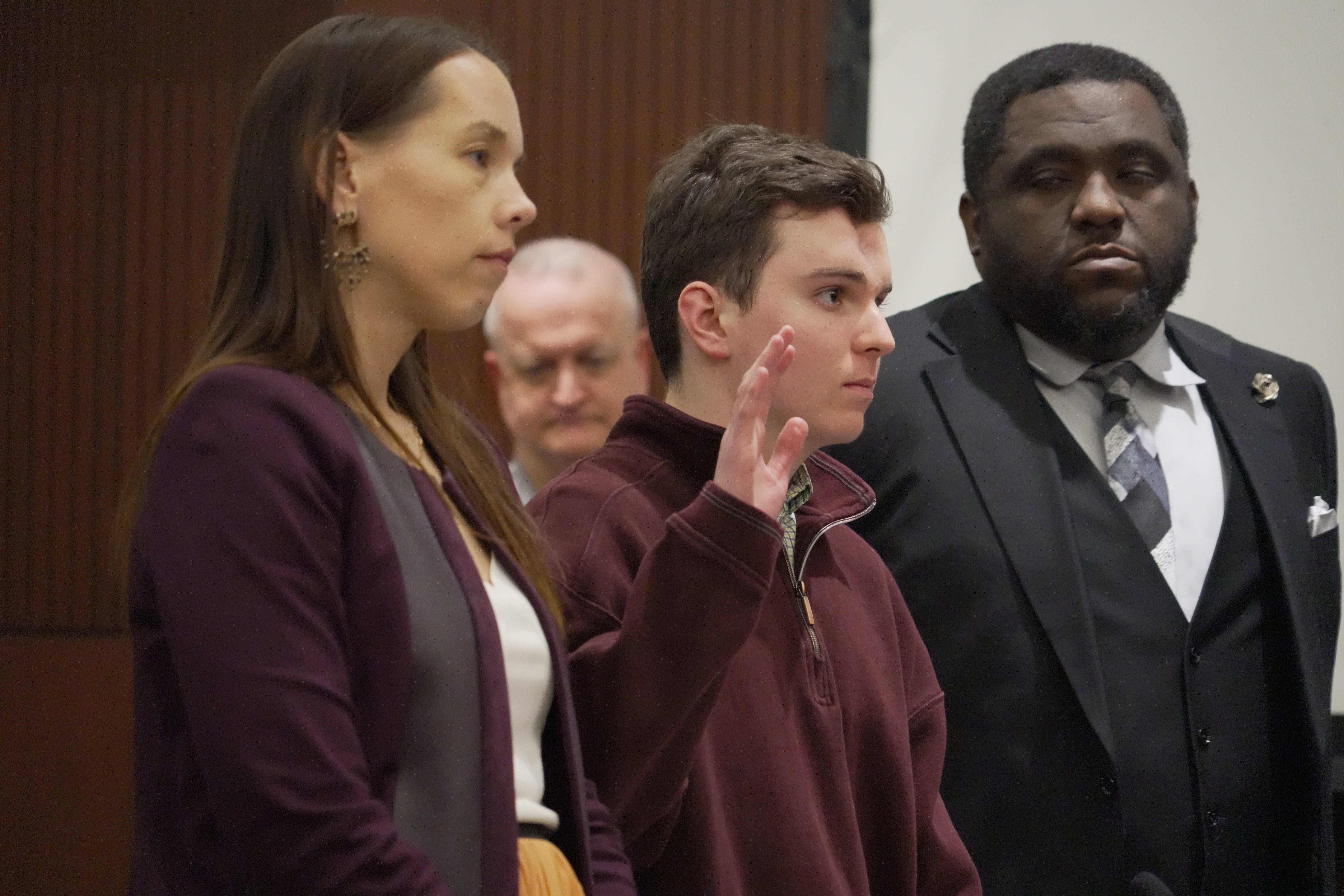 Austin Thompson is sworn in during a hearing in Wake County Superior Court on Wednesday, Jan. 21, 2026, in Raleigh, N.C. (AP Photo/Allen G. Breed)
