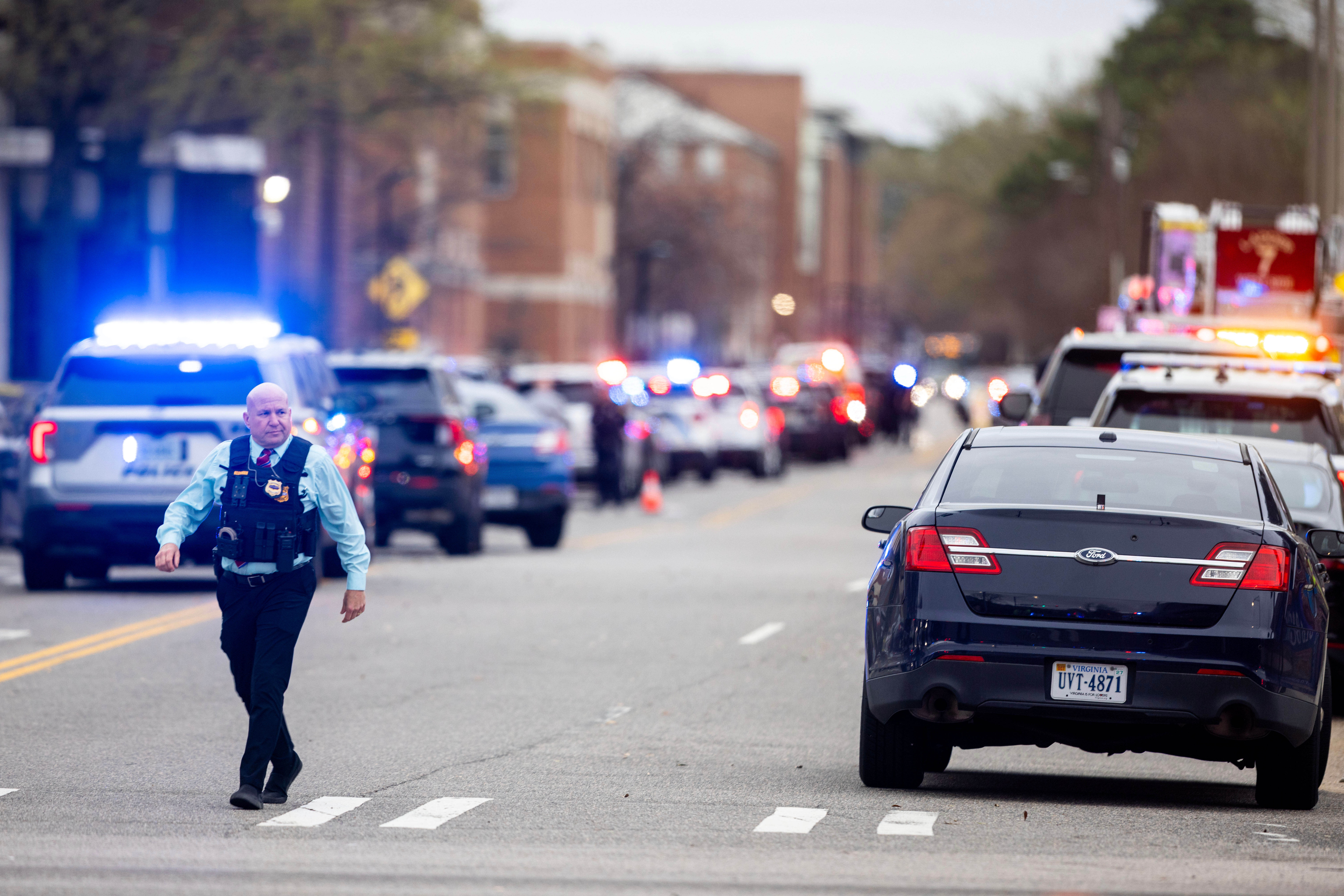 Emergency officials gather outside Old Dominion University's campus after a shooting unfolded Thursday morning