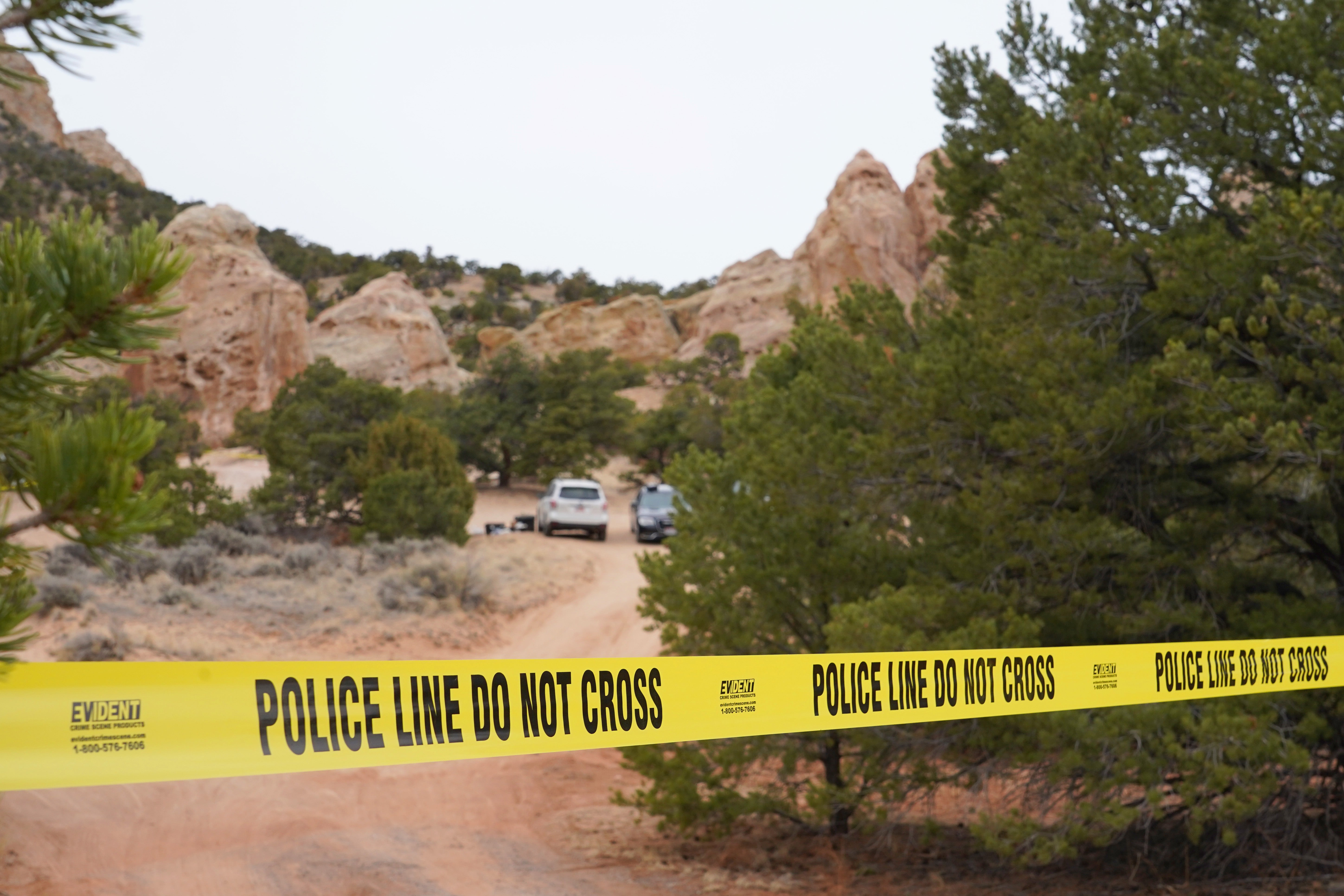 Authorities conduct an investigation Thursday, March 5, 2026, into the deaths of two women a day earlier on a trail just west of Capitol Reef National Park near Teasdale, Utah